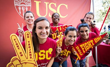 Six USC female fans pose and show their school spirit